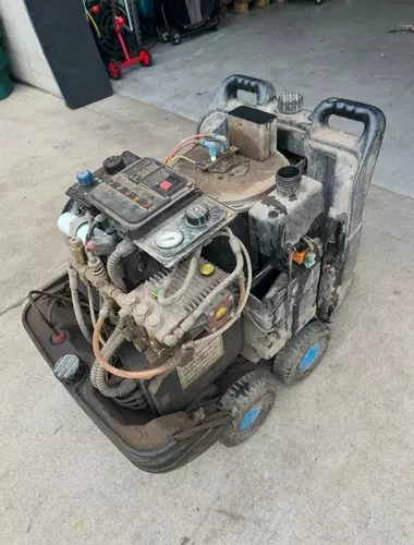Edge Panther pressure washer before service showing dirty condition and poor running performance